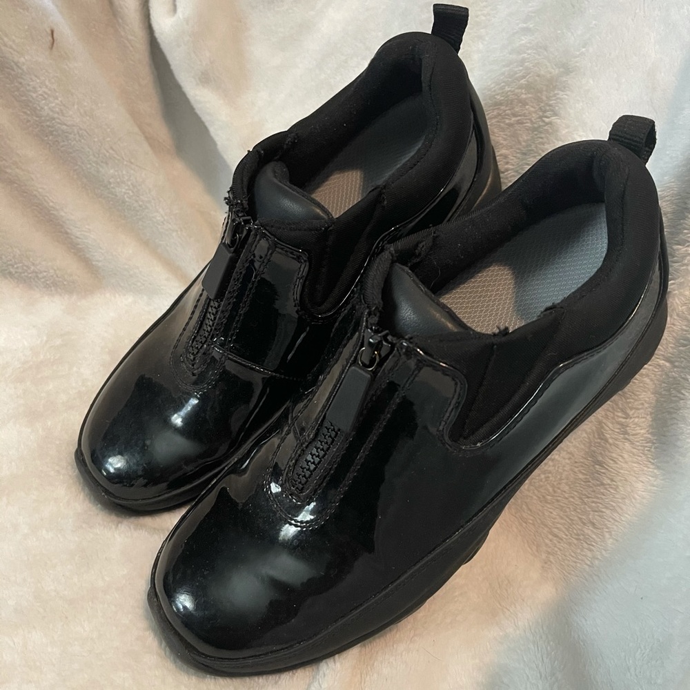 Woman’s cougar rain shoes